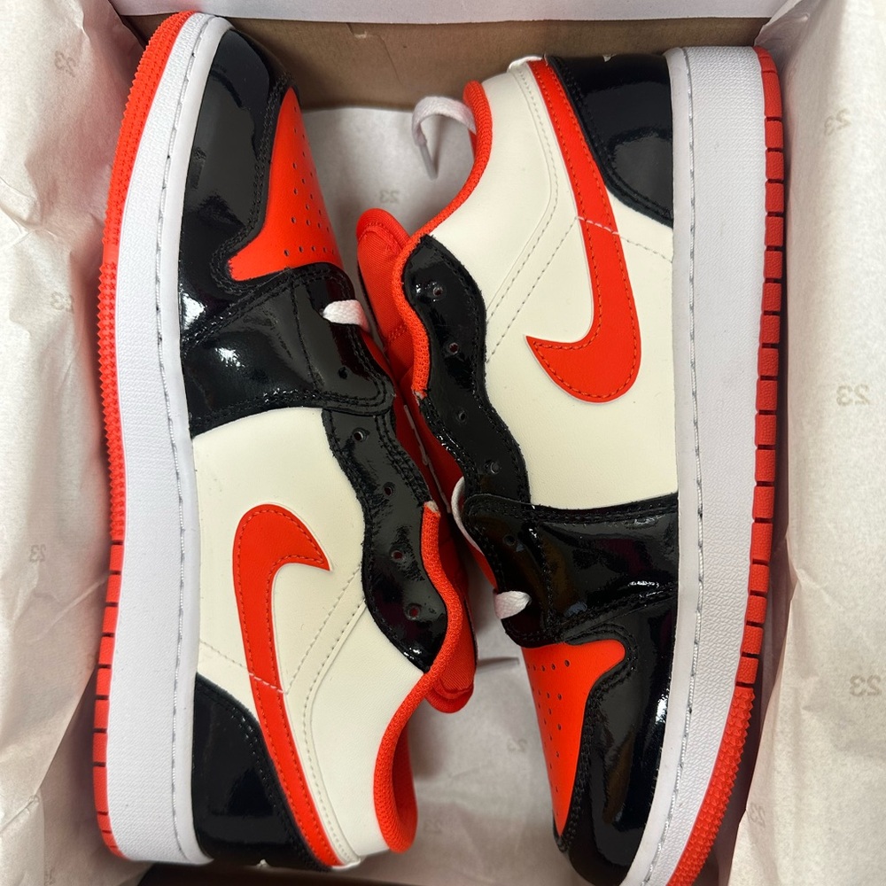 Jordan 1 Low, Team Orange and Black patent, Youth Size 6.5. Womens 8.